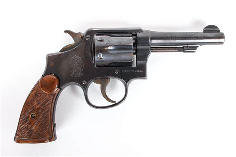 If so, the right side of the barrel would read 32 WCF CTG between two Maltese. . Smith and wesson 38 special serial number lookup